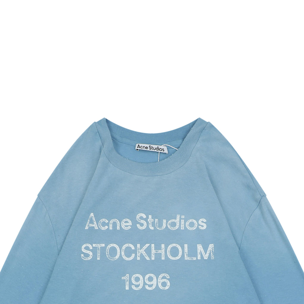 Acne Studios 1996 Distressed Logo Print Long Sleeve Tee – Ice Blue
